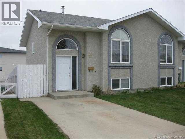 11 Chilcotin Crescent W, Lethbridge, Alberta  T1K 7G8 - Photo 1 - A2346374