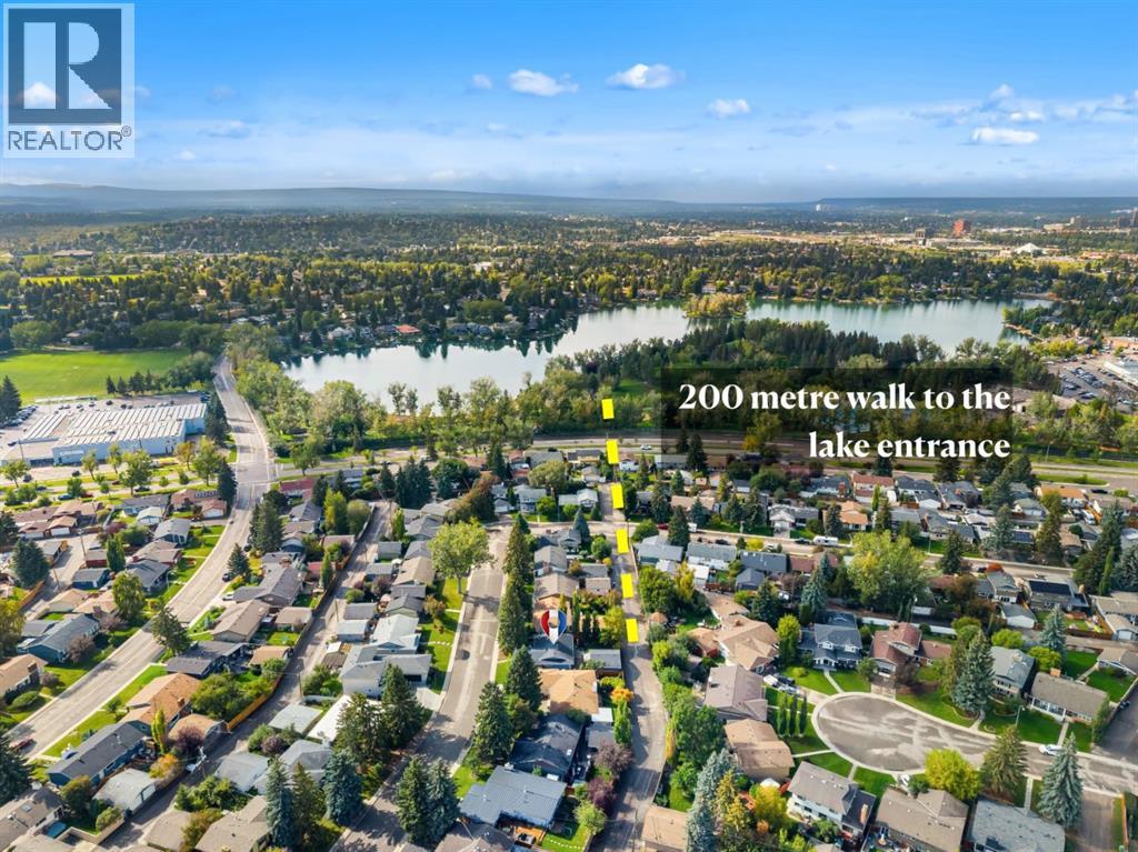 839 Lake Twintree Crescent Se, Calgary, Alberta  T2J 2W4 - Photo 2 - A2343863