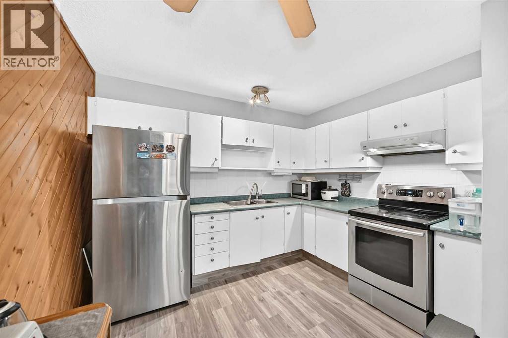 320 Abinger Crescent Ne, Calgary, Alberta  T2A 6L3 - Photo 4 - A2345691