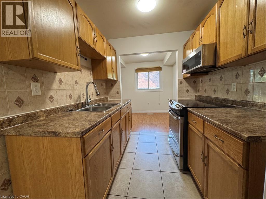 100 Quigley Road Unit# 14, Hamilton, Ontario  L8K 6J1 - Photo 3 - 40861700