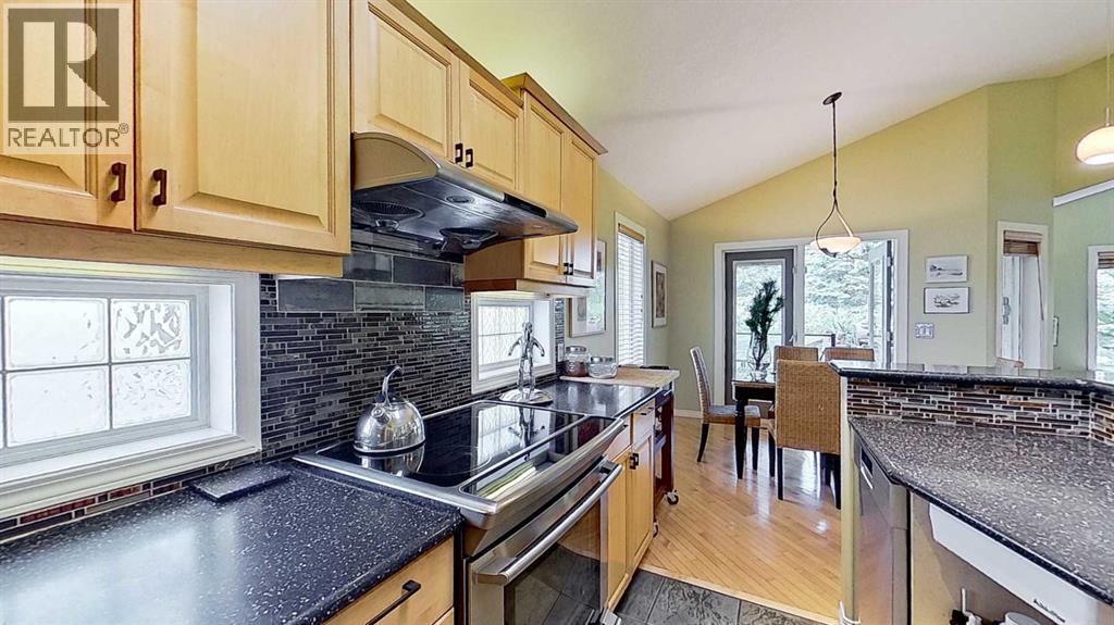 18 Tuscany Meadows Heights Nw, Calgary, Alberta  T3L 2L2 - Photo 9 - A2347624