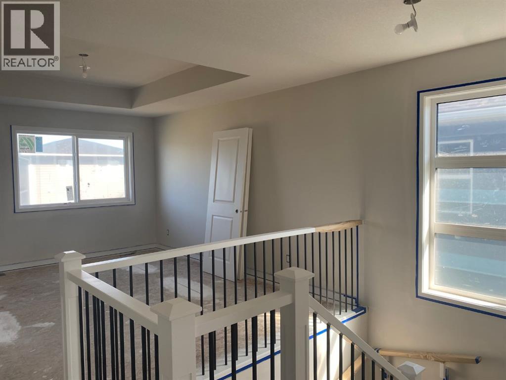 716 Mandalay Boulevard, Carstairs, Alberta  T0M 0N0 - Photo 11 - A2343329