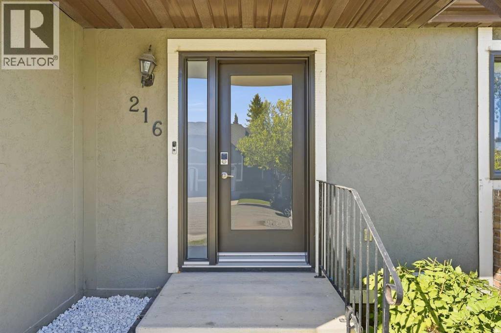 216 Coach Side Road SW, Calgary, Alberta  T3H 2T3 - Photo 3 - A2347051