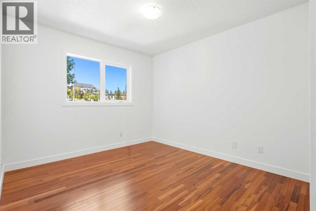 216 Coach Side Road SW, Calgary, Alberta  T3H 2T3 - Photo 14 - A2347051