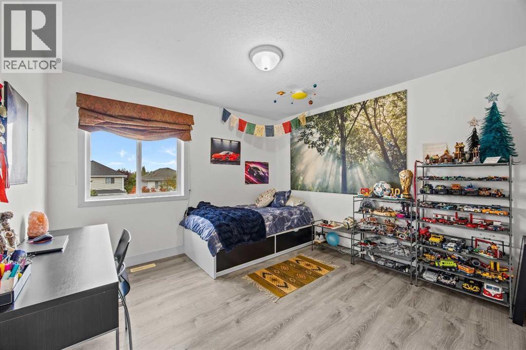 296 Hidden Ranch Circle NW, Calgary, Alberta  T3A 5R2 - Photo 32 - A2348654