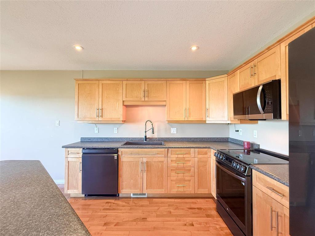 79 Aldrin Way SE, Brandon, Manitoba  R7A 2V7 - Photo 7 - 202623583