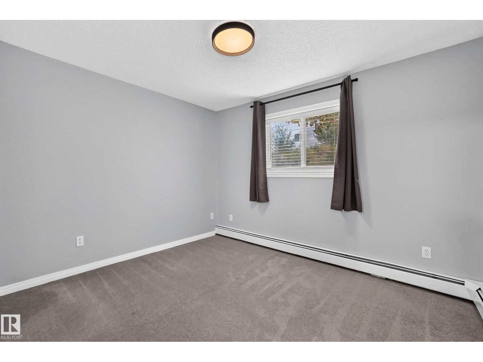 #112 11325 83 ST NW