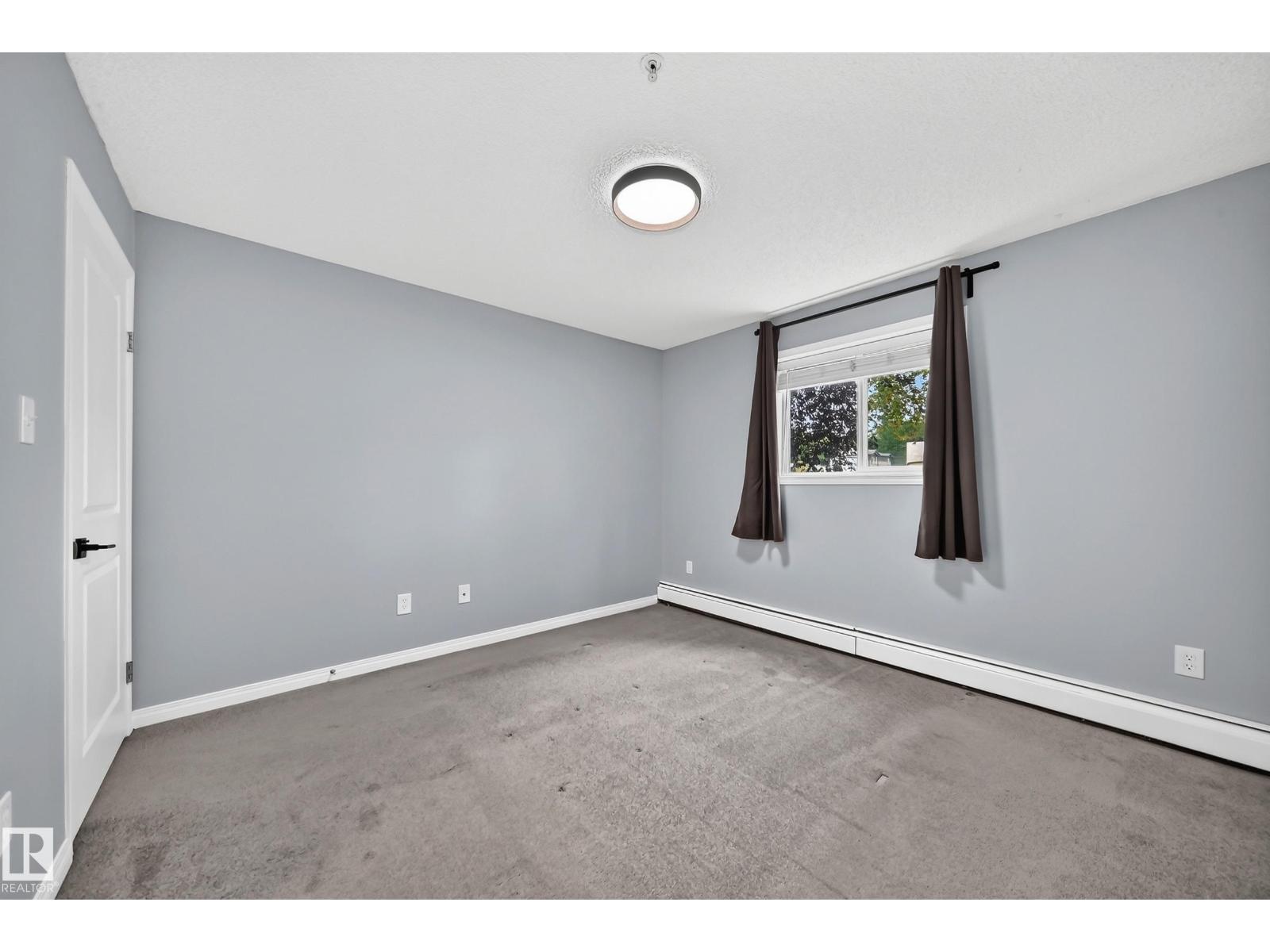 #112 11325 83 ST NW