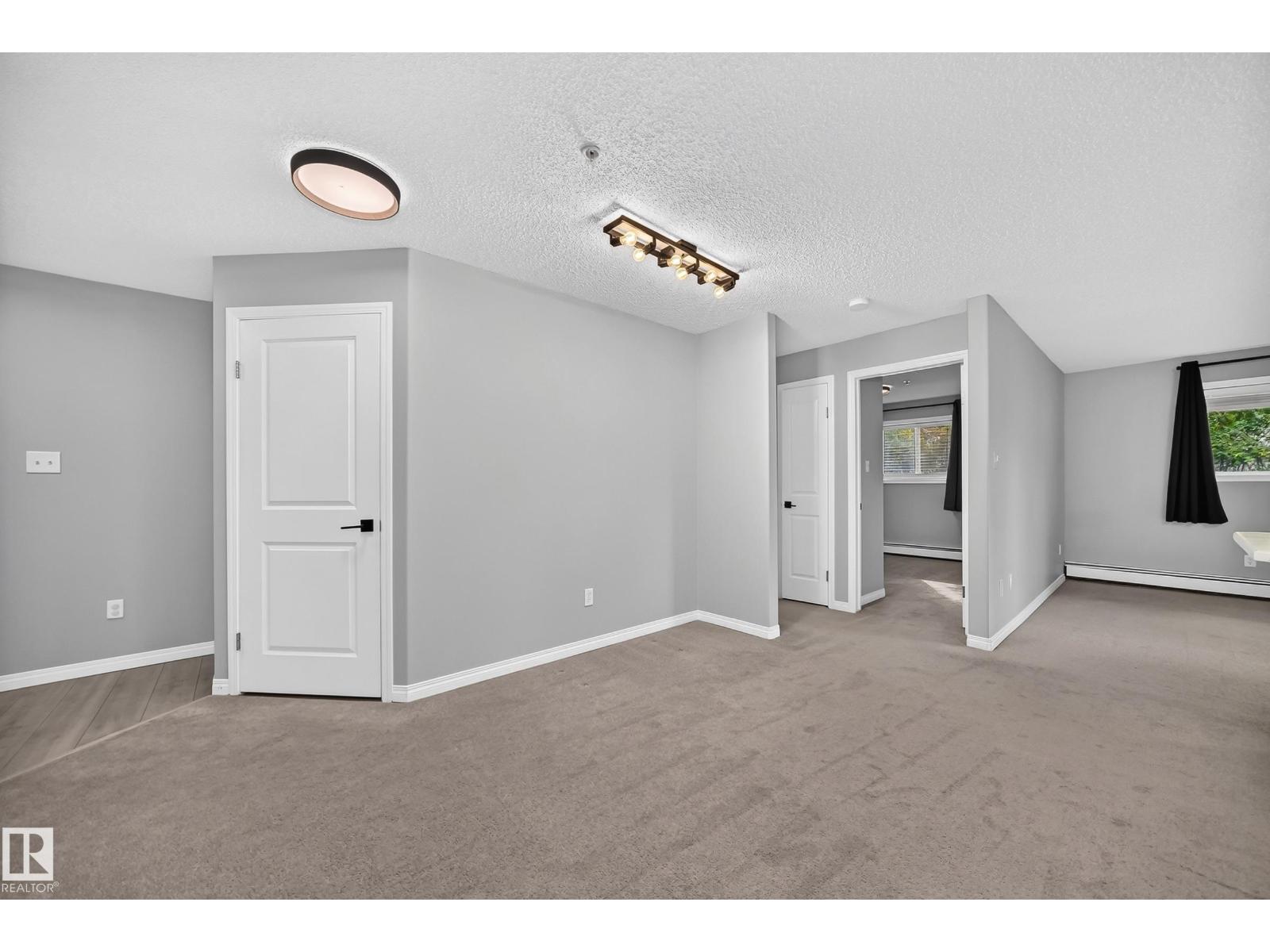 #112 11325 83 ST NW