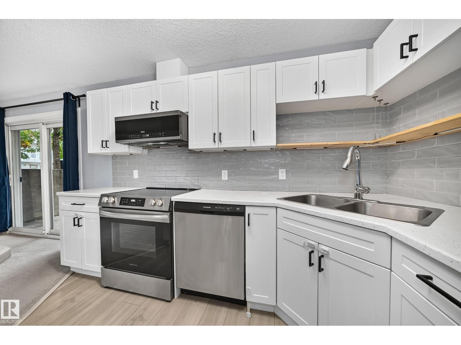 #112 11325 83 ST NW