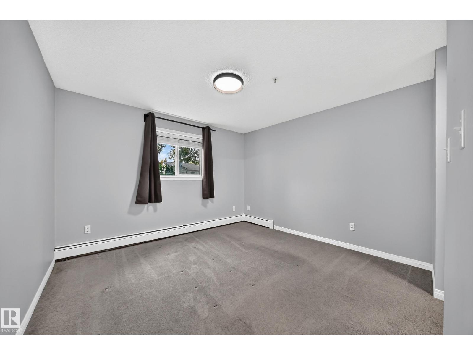 #112 11325 83 ST NW