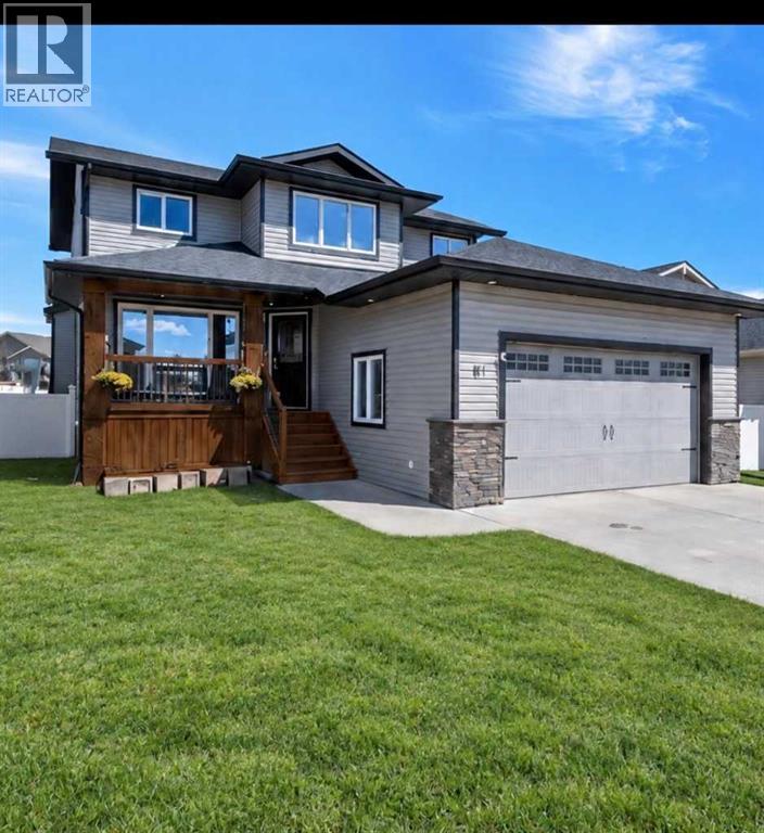 If quality finishes and tasteful upgrades are what you’ve been searching for, this beautiful two-storey home won’t disappoint! Rich oak hardwood flooring welcomes you at the front entrance and extends throughout the main and upper levels, complemented by striking granite tile in the bathrooms. Just off the entry is a versatile flex room perfect for a home office, gym or playroom, while the heart of the home opens into a bright, open-concept kitchen, dining, and living area filled with natural light from the large backyard windows.   The inviting living room features a cozy gas fireplace with tile surround, creating the perfect gathering space. The kitchen is truly the showpiece, offering warm ivory cabinetry, gorgeous granite countertops, a stylish tile backsplash, a convenient eating bar with seating for four and a walk-through pantry.  Upstairs, the spacious primary suite offers a walk-in closet and a luxurious five-piece ensuite complete with a supersized shower, separate soaker tub, and private water closet. Two additional bedrooms are connected by a well-designed four-piece bathroom, and the conveniently located upper-floor laundry adds everyday practicality.  The fully finished basement provides two more bedrooms (one with a walk-in closet and dressing area), a large family and games room, and another full bathroom, making it ideal for a growing family or guests.  Outside, you’ll appreciate the double attached garage, wide front driveway, fully fenced yard with maintenance-free vinyl fencing, and a large storage shed that could even serve as a clubhouse. This is far from your typical cookie-cutter home—it’s a thoughtfully designed property with quality finishes, functional space, and exceptional value. (id:48254)