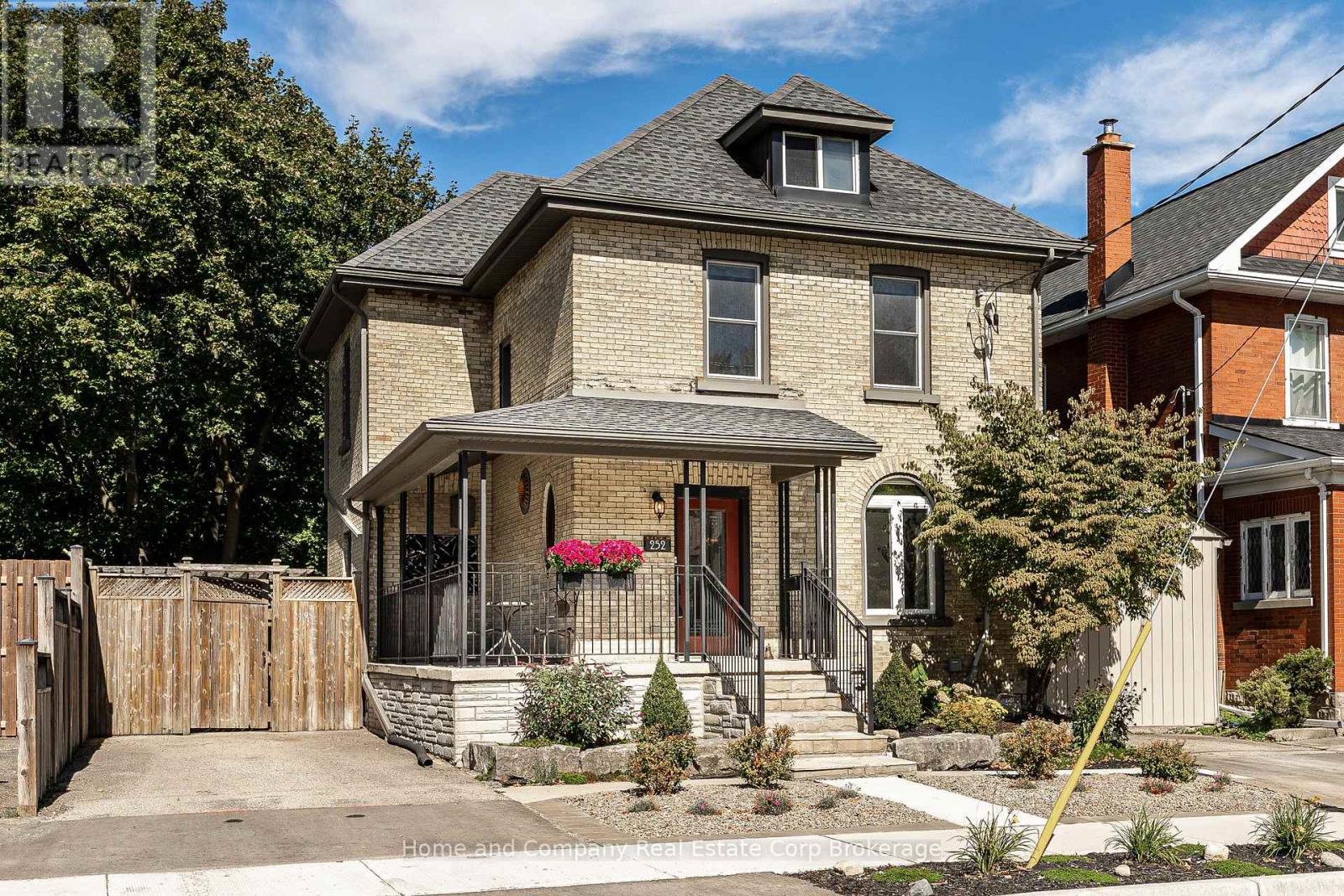 Character, Charm and Comfort.  This home has it all!  Just a short walk from the vibrant downtown core, all renowned theatres and the tranquil park system, is where you will find 252 Albert Street. This 2.5 story has been well cared for and tastefully updated. Curb appeal is heightened by a newly refaced front yard and steps, and a welcoming wrap around porch.  Inside, the bright and airy formal living room/dining room with gas fireplace allows plenty of natural light in. For those more relaxed days, enjoy visiting with guests in the cozy family room for movie night or just great conversation.  The beautiful kitchen boasts quartz countertops, fresh backsplash and a functional design.  On this level you will find a convenient 2 piece bathroom and laundry room.  There are 3 well sized bedrooms on the second level and lovely 4 piece bathroom.  Outside, the low maintenance back yard is both inviting and private, and the play park is right across the street if the kids want to run and play.  Enjoy the advantage of 2 private driveways, one on either side of the house.  Freshly painted, newer windows and basement walk out to the backyard are a few mentionable features of this gorgeous home.  Come see for yourself! Now is your chance. (id:48254)