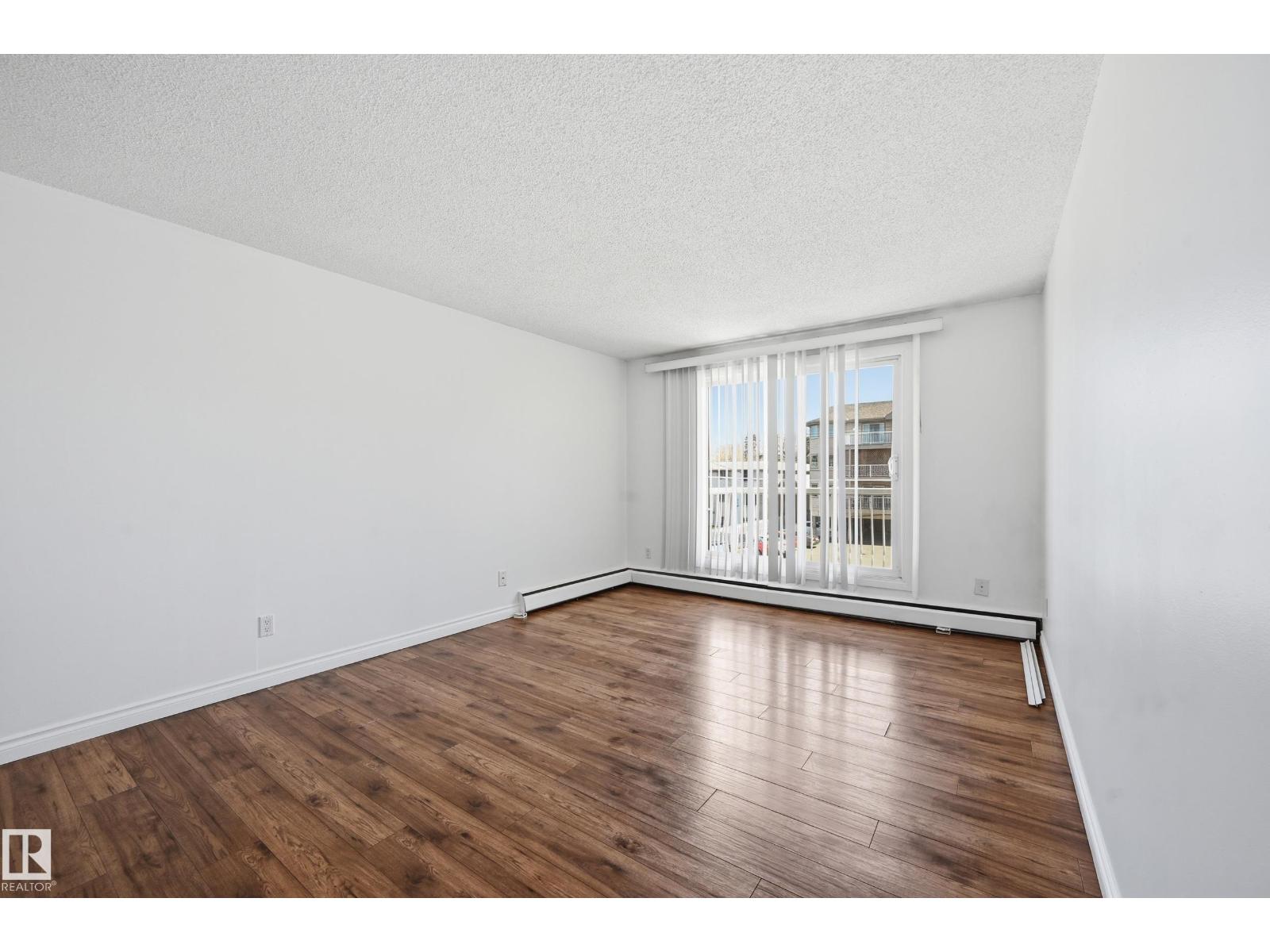 #305 10811 115 ST NW
