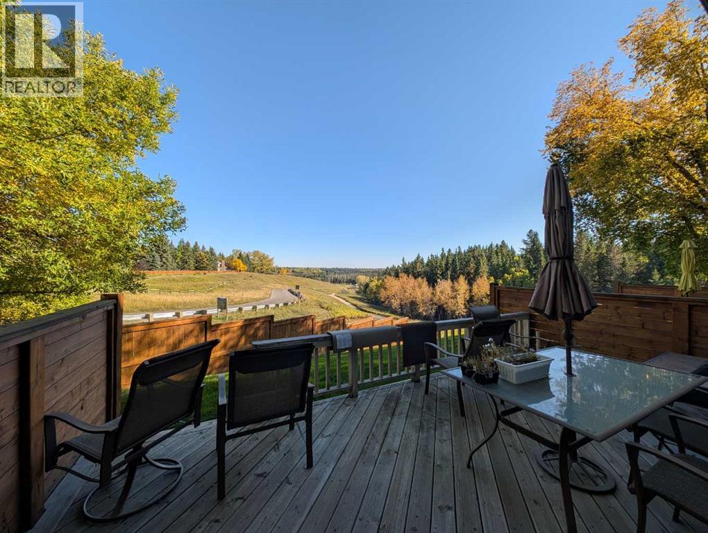 22, 64 Woodacres Crescent Sw, Calgary, Alberta  T2W 4V6 - Photo 5 - A2347505