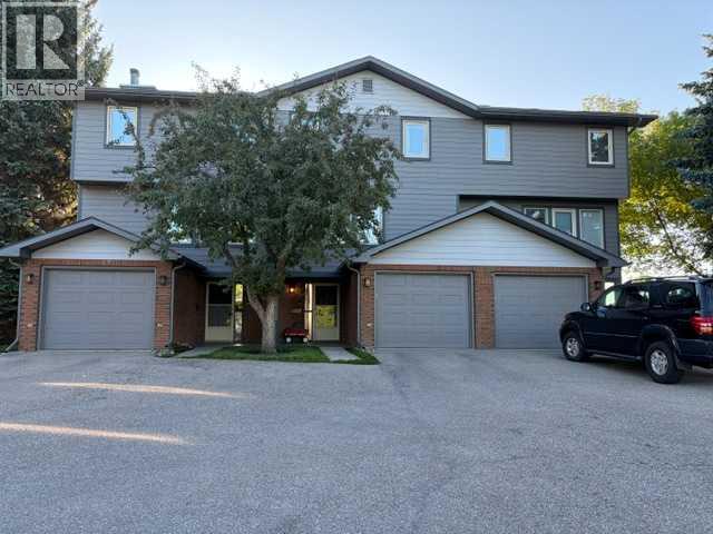 22, 64 Woodacres Crescent Sw, Calgary, Alberta  T2W 4V6 - Photo 4 - A2347505