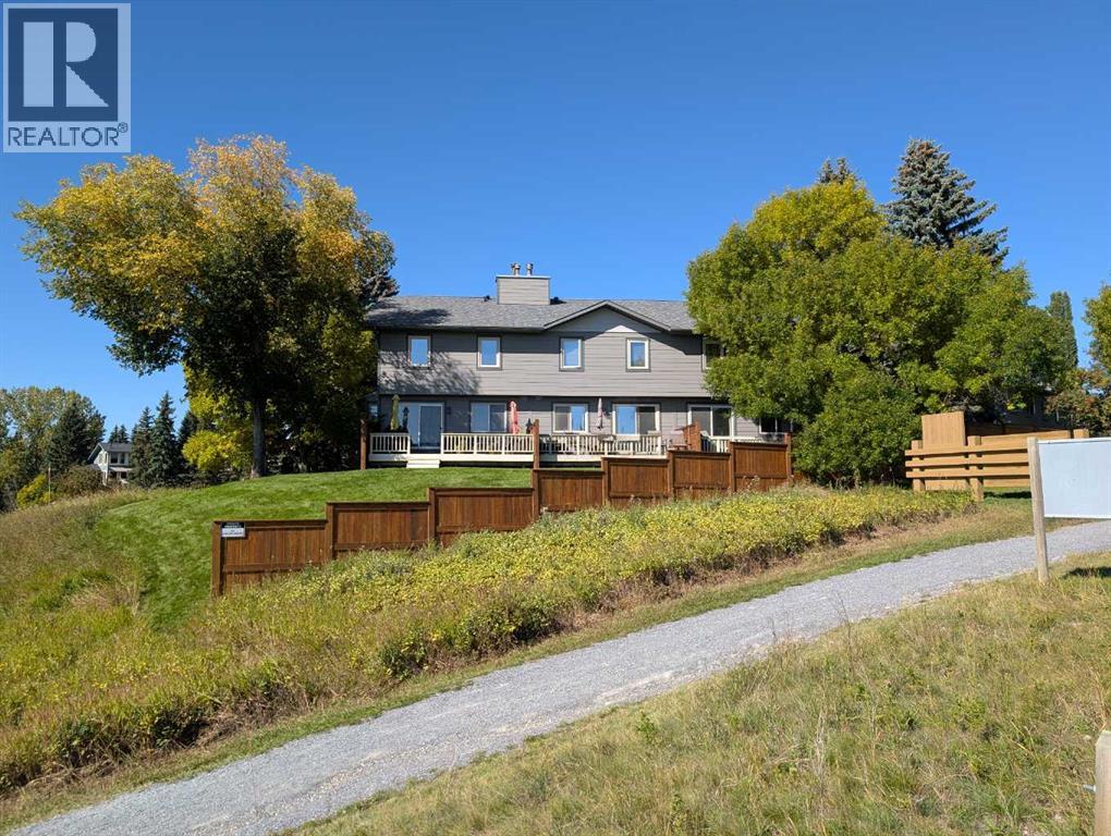 22, 64 Woodacres Crescent Sw, Calgary, Alberta  T2W 4V6 - Photo 9 - A2347505