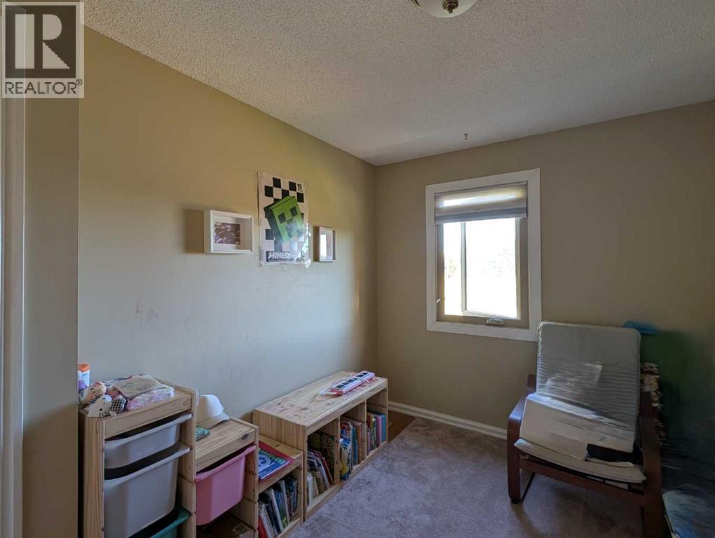 22, 64 Woodacres Crescent Sw, Calgary, Alberta  T2W 4V6 - Photo 14 - A2347505