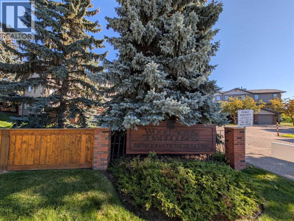 22, 64 Woodacres Crescent Sw, Calgary, Alberta  T2W 4V6 - Photo 2 - A2347505