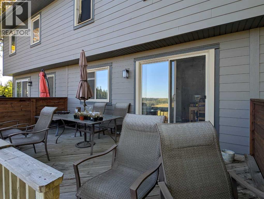 22, 64 Woodacres Crescent Sw, Calgary, Alberta  T2W 4V6 - Photo 3 - A2347505