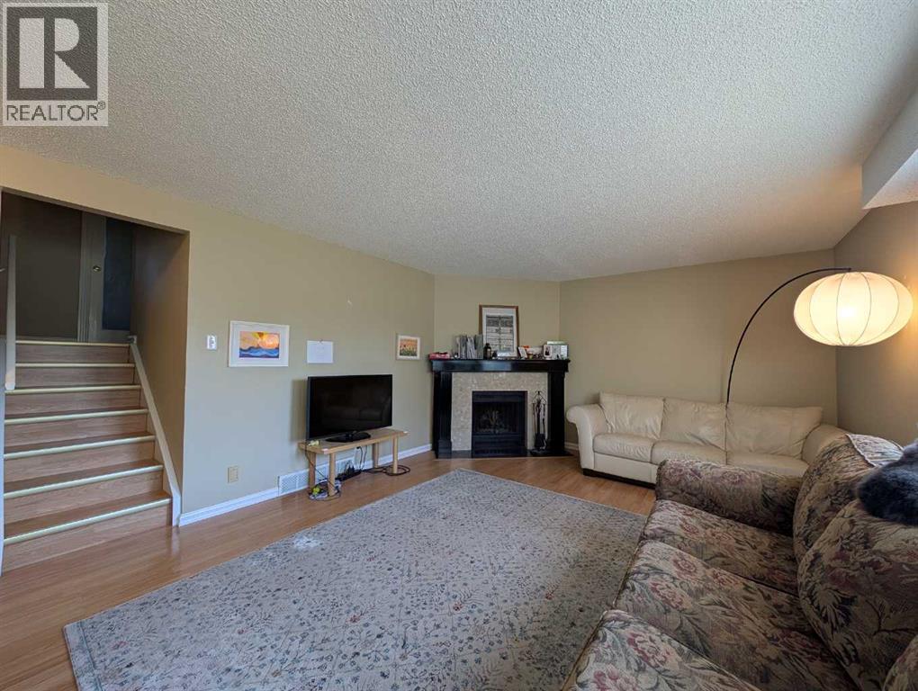 22, 64 Woodacres Crescent Sw, Calgary, Alberta  T2W 4V6 - Photo 13 - A2347505
