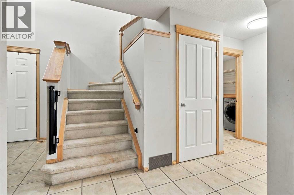 209 Tuscany Ravine Road NW, Calgary, Alberta  T3L 2W9 - Photo 11 - A2348835