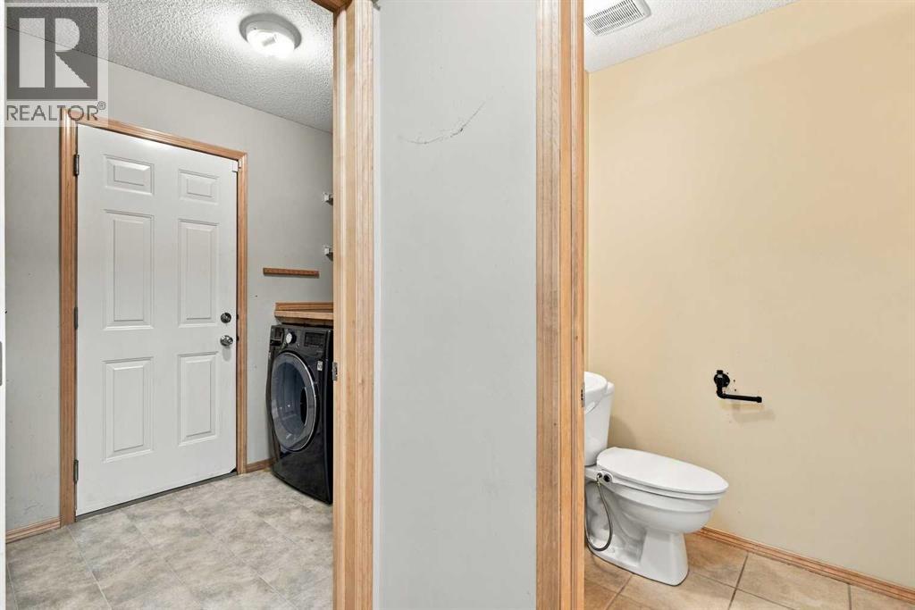 209 Tuscany Ravine Road NW, Calgary, Alberta  T3L 2W9 - Photo 12 - A2348835