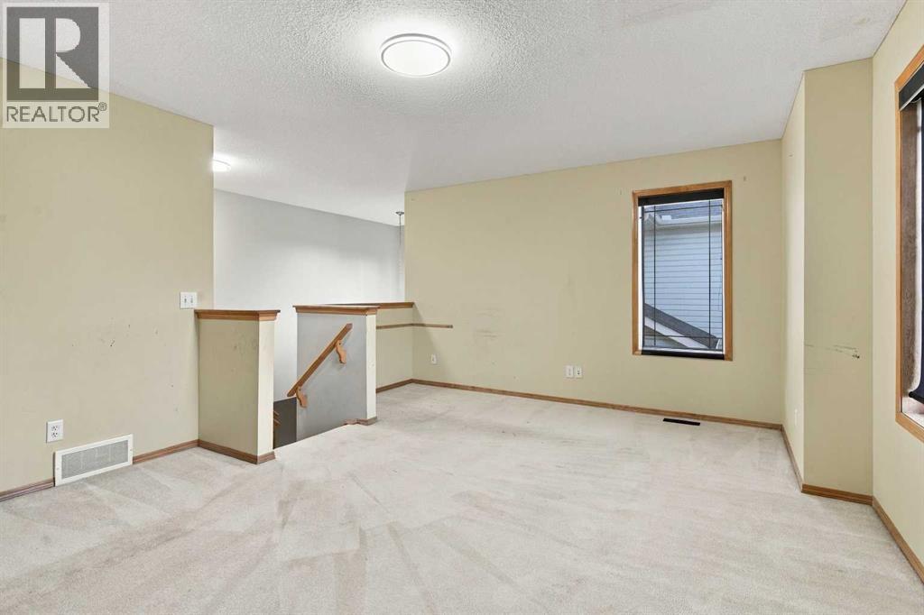 209 Tuscany Ravine Road NW, Calgary, Alberta  T3L 2W9 - Photo 14 - A2348835