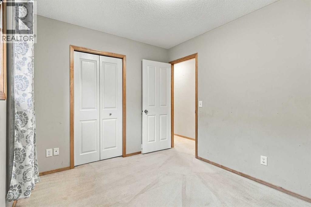 209 Tuscany Ravine Road NW, Calgary, Alberta  T3L 2W9 - Photo 18 - A2348835