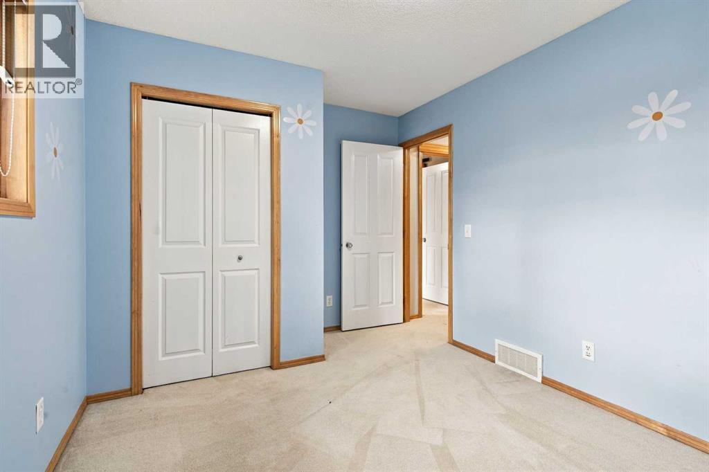 209 Tuscany Ravine Road NW, Calgary, Alberta  T3L 2W9 - Photo 21 - A2348835