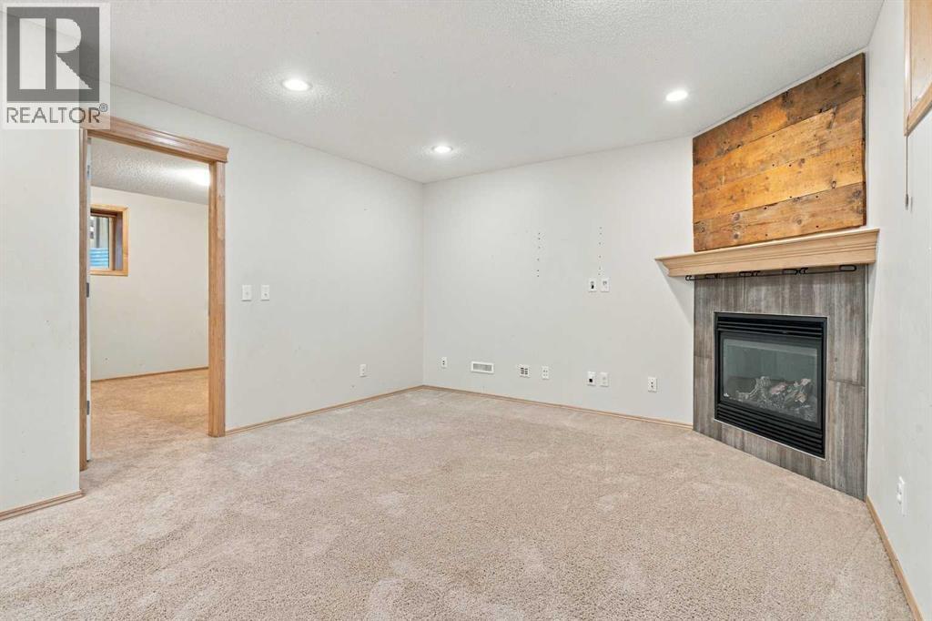 209 Tuscany Ravine Road NW, Calgary, Alberta  T3L 2W9 - Photo 29 - A2348835