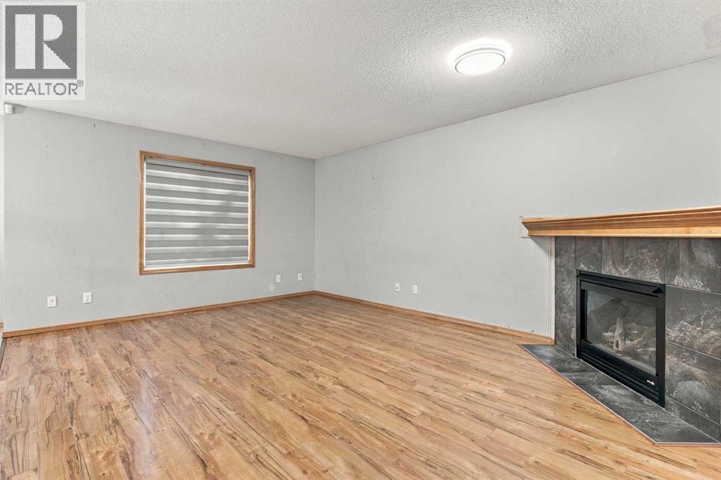 209 Tuscany Ravine Road NW, Calgary, Alberta  T3L 2W9 - Photo 9 - A2348835