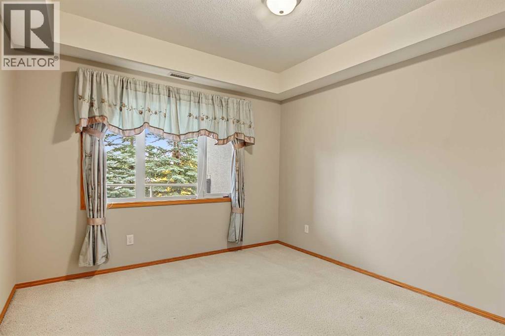 209, 15 Everstone Drive SW