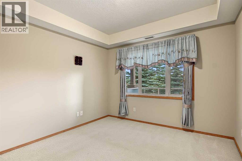 209, 15 Everstone Drive SW