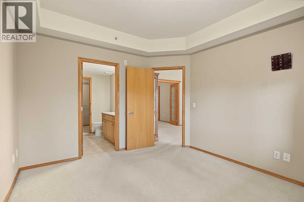 209, 15 Everstone Drive SW
