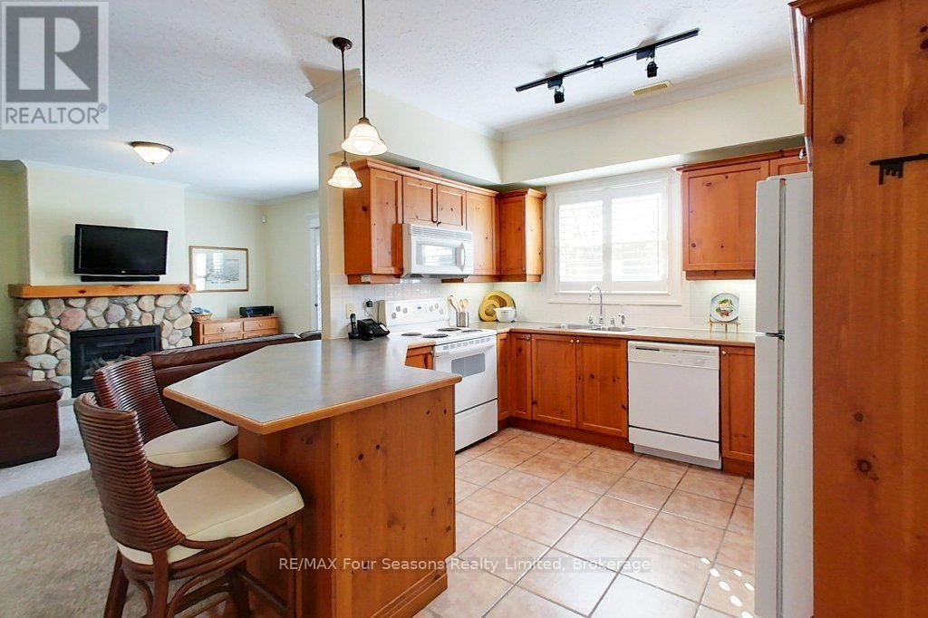 201 - 184 Snowbridge Way, Blue Mountains, Ontario L9Y 0V1 - Photo 7 - X13843960