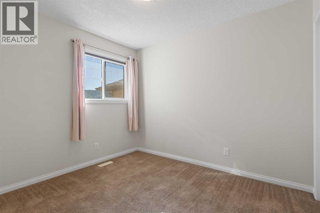 192 Sunset Point, Cochrane, Alberta  T4C 0L1 - Photo 19 - A2347421