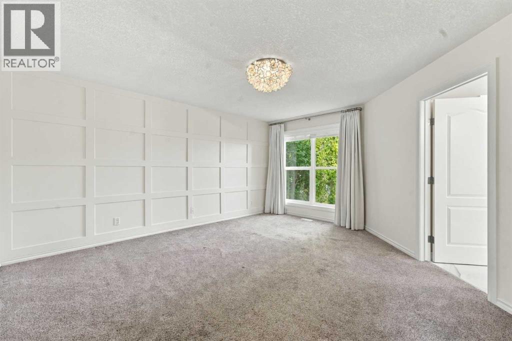 113 Ypres Green Sw, Calgary, Alberta  T2T 6M3 - Photo 19 - A2323191
