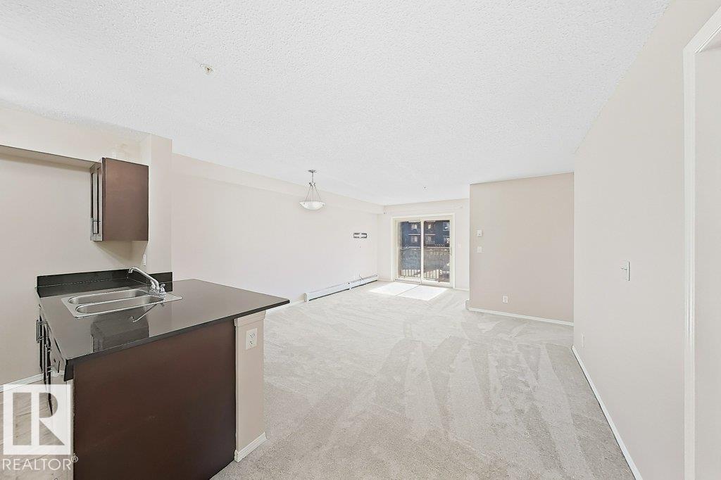 #203 12025 22 AVE SW SW