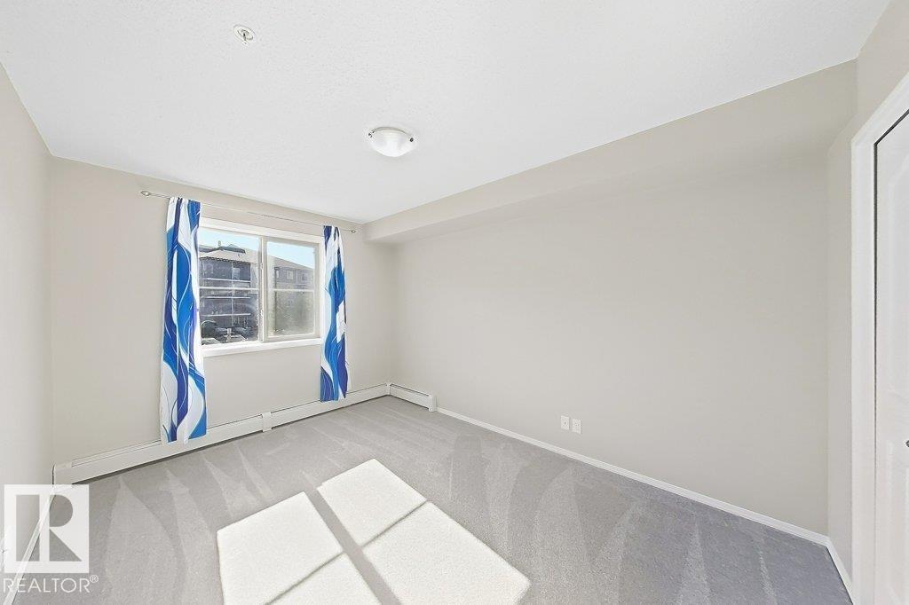 #203 12025 22 AVE SW SW