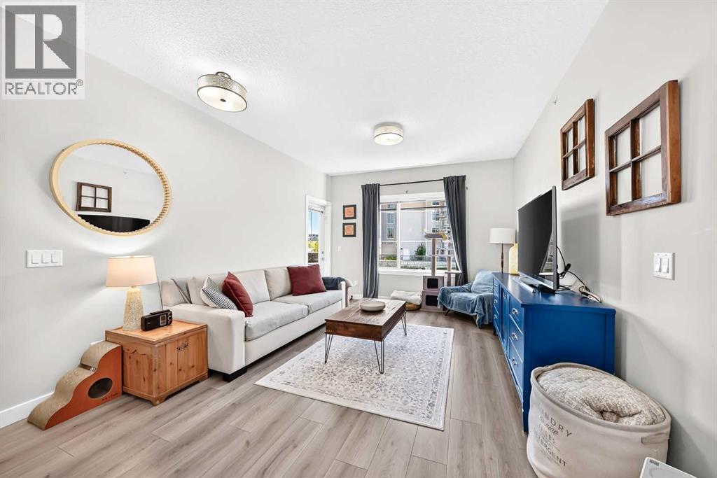 203, 20 Sage Hill Terrace NW
