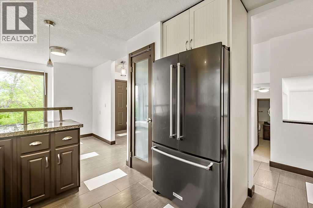 200 Bernard Drive Nw, Calgary, Alberta  T3K 2B7 - Photo 10 - A2339584