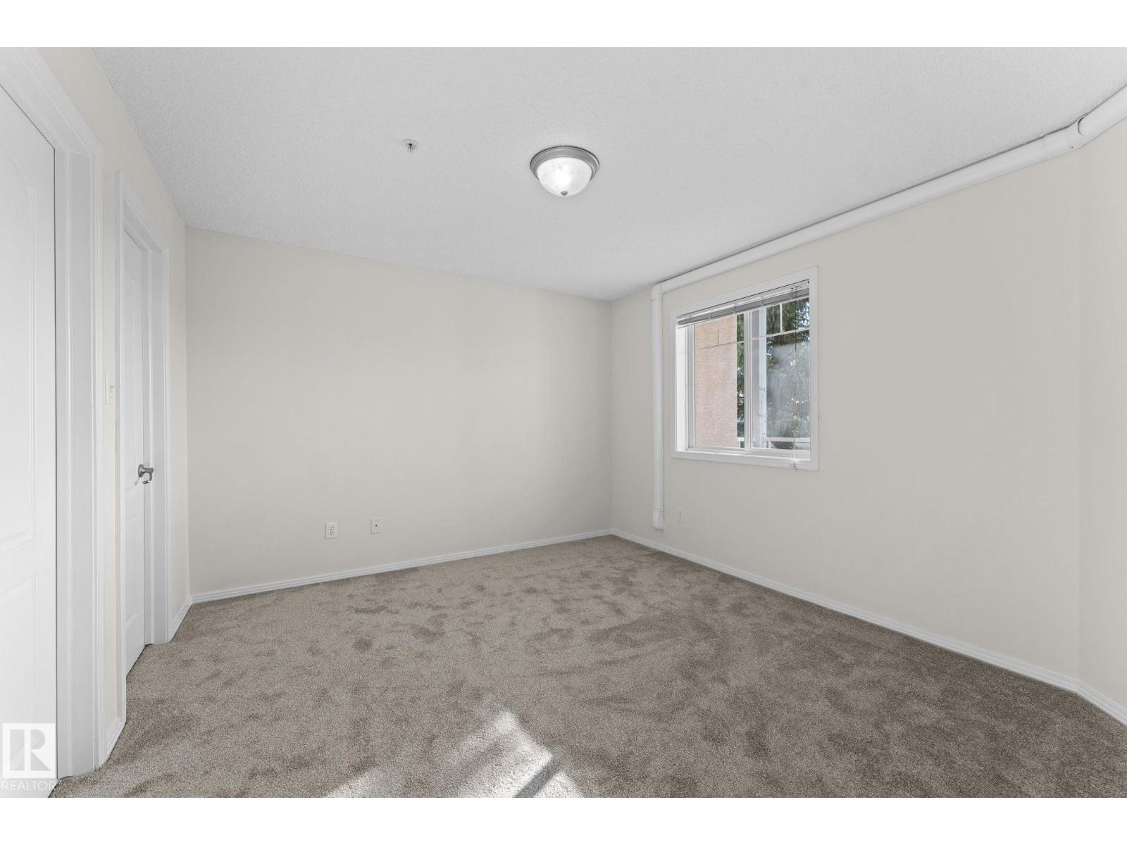 #207 2420 108 ST NW