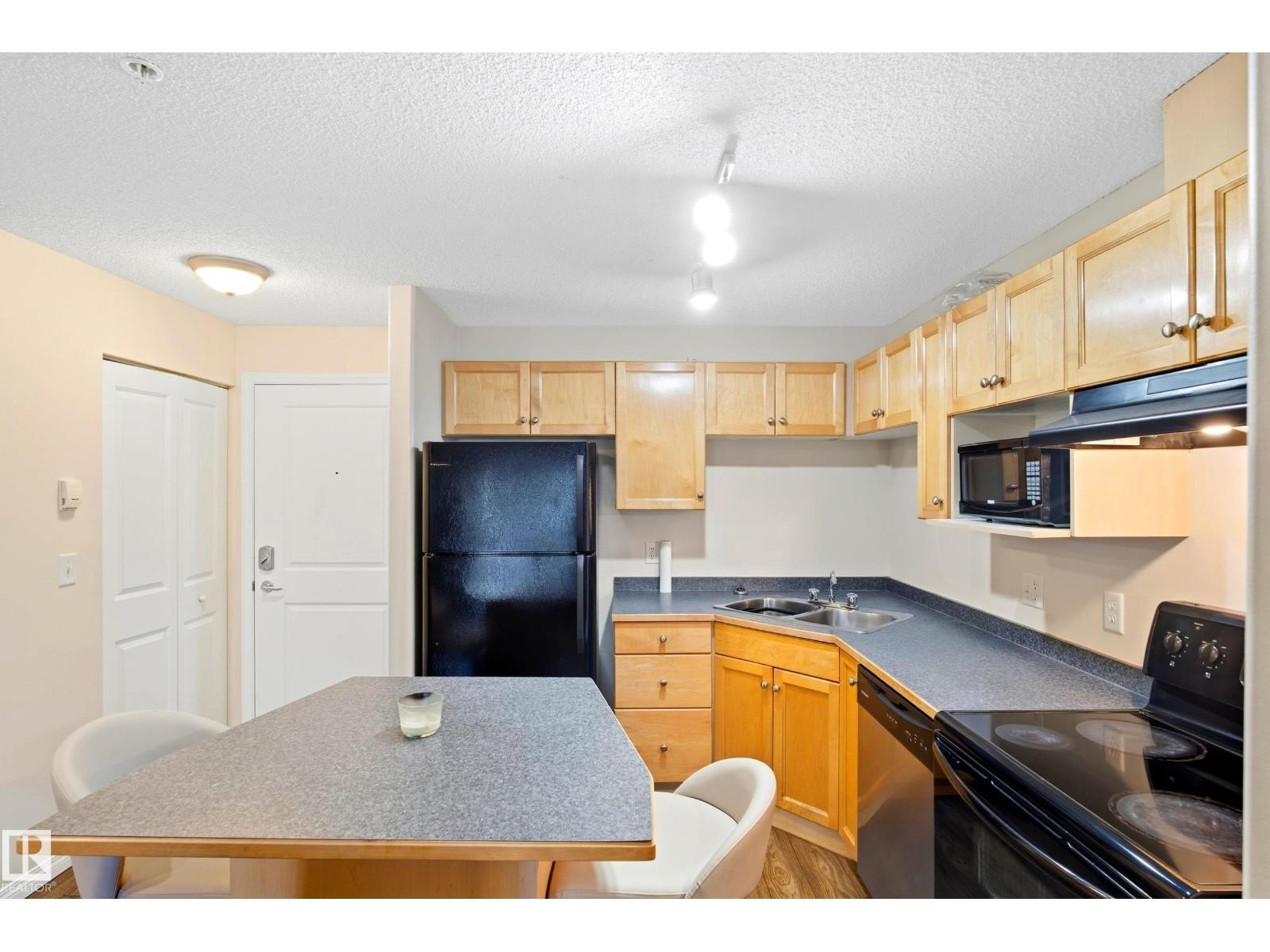 #203 245 EDWARDS DR SW