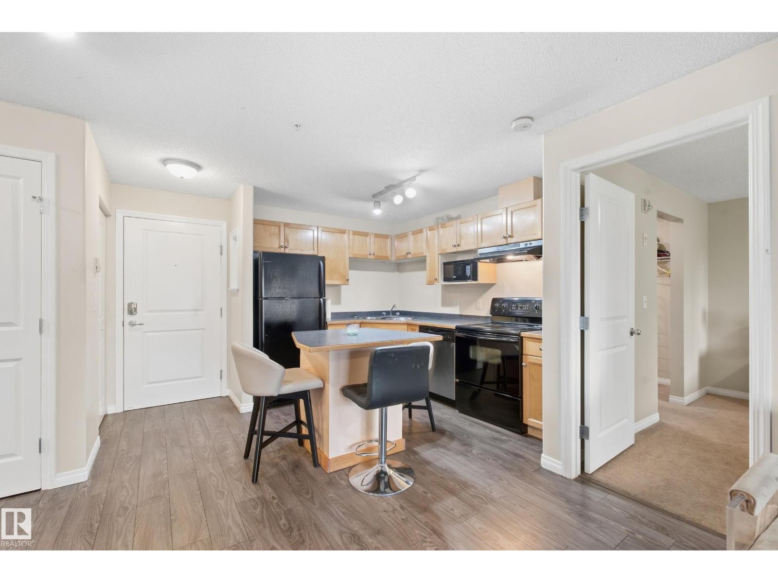 #203 245 EDWARDS DR SW