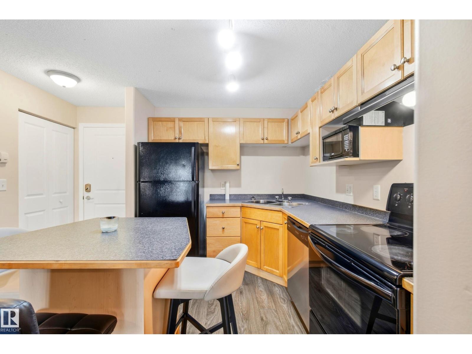 #203 245 EDWARDS DR SW