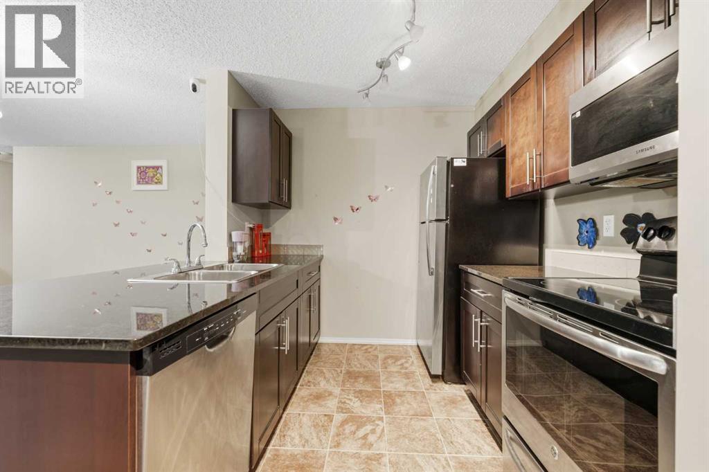 301, 15 Saddlestone Way NE, Calgary, Alberta  T3J 0S3 - Photo 14 - A2344117