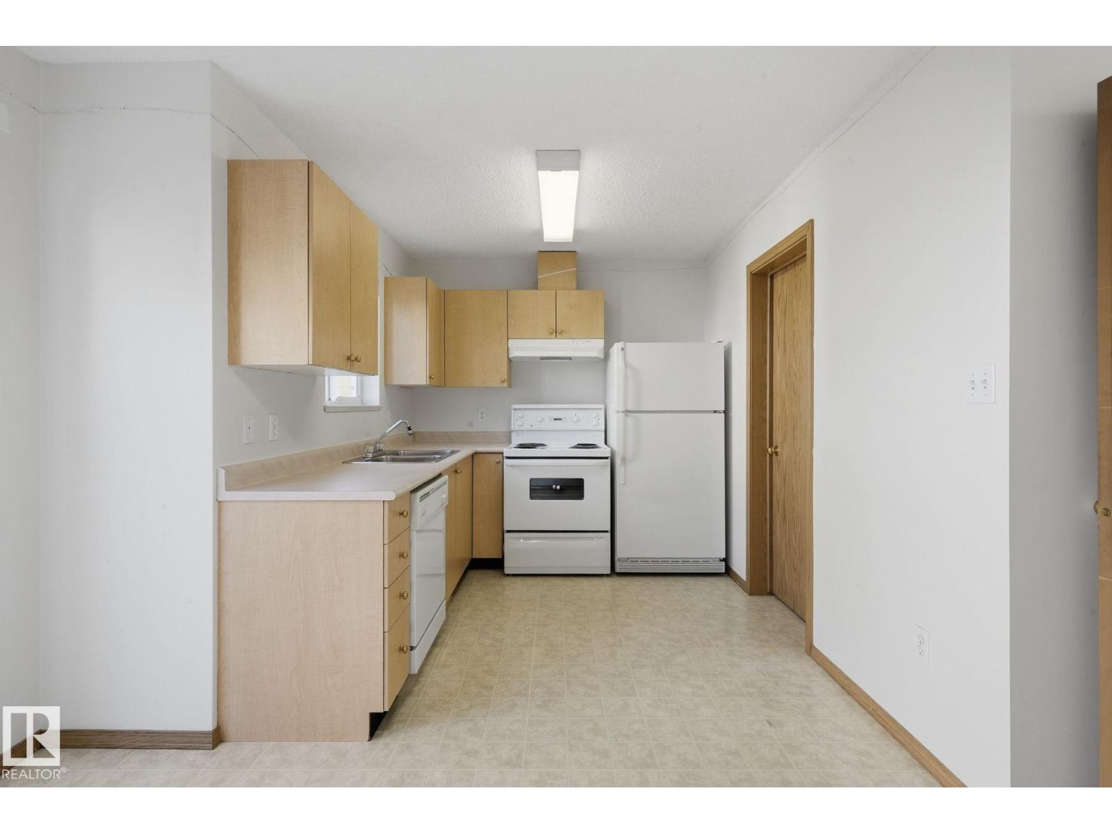 #408 610 KING ST