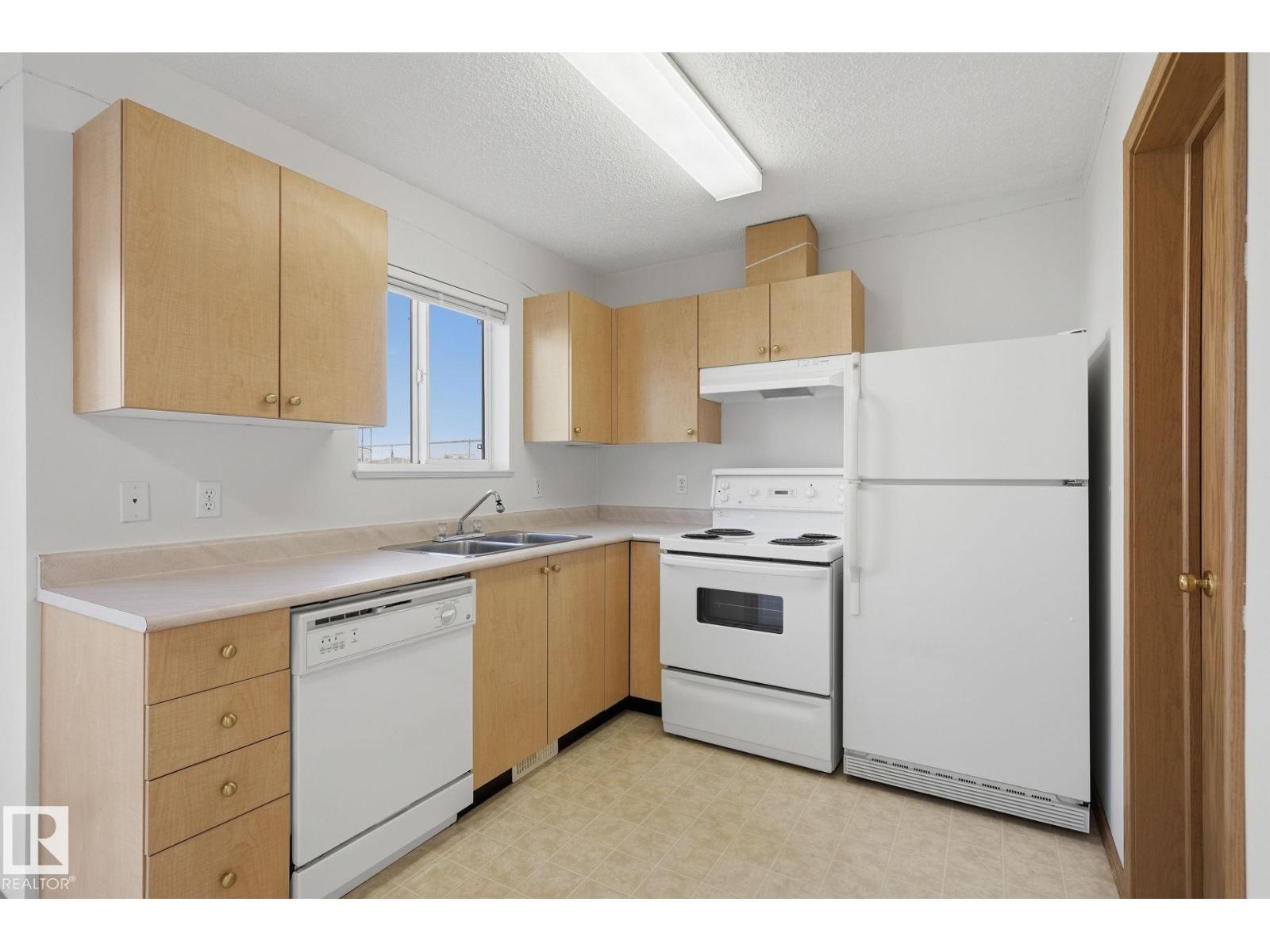 #408 610 KING ST