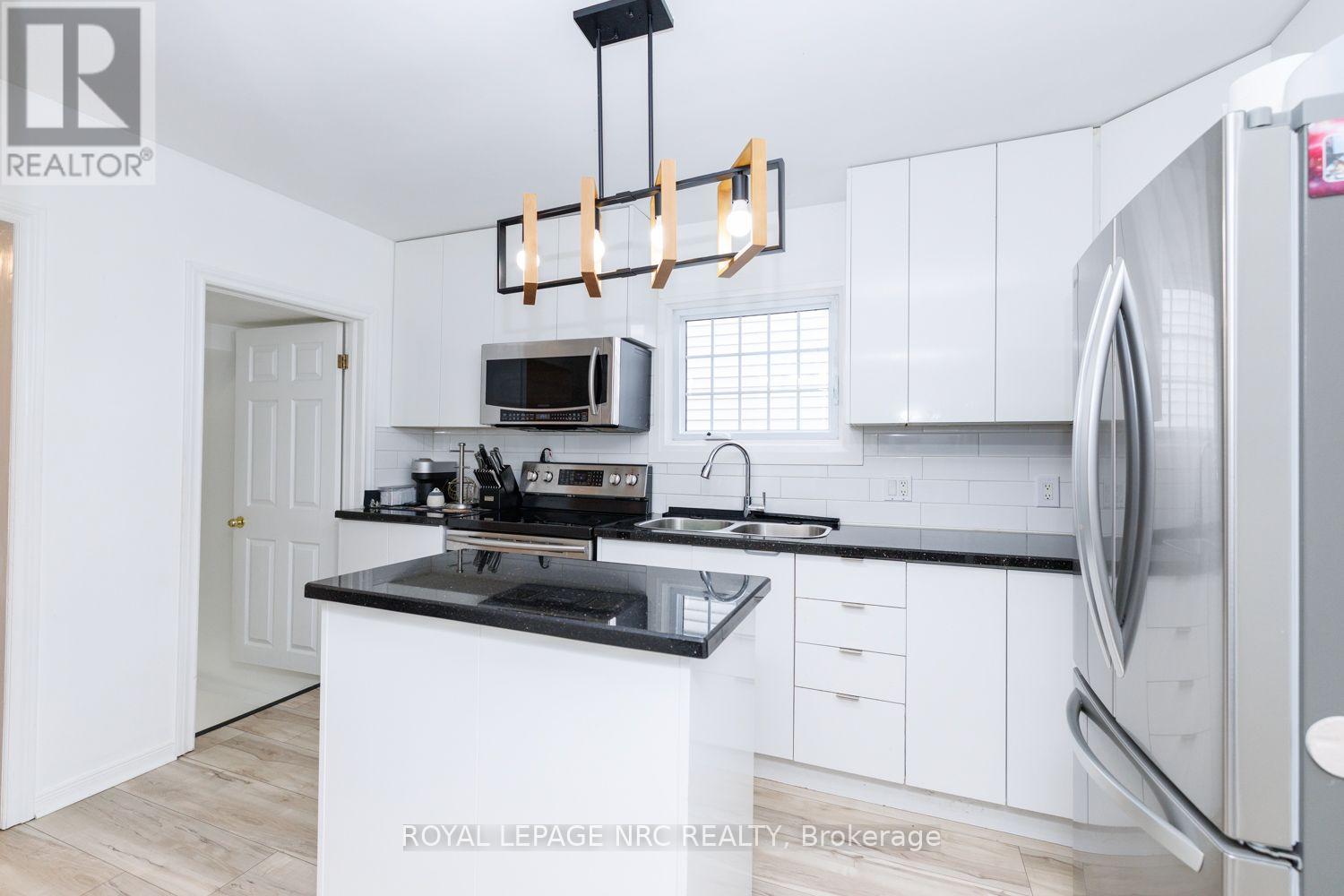 243 Geneva Street, St. Catharines, Ontario  L2R 4R2 - Photo 7 - X13846972